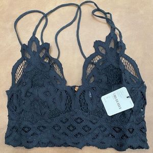 Free people bralettes. One black and one white. Sold as set. Still in packages.